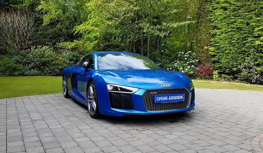 Blue Audi R8 in a driveway